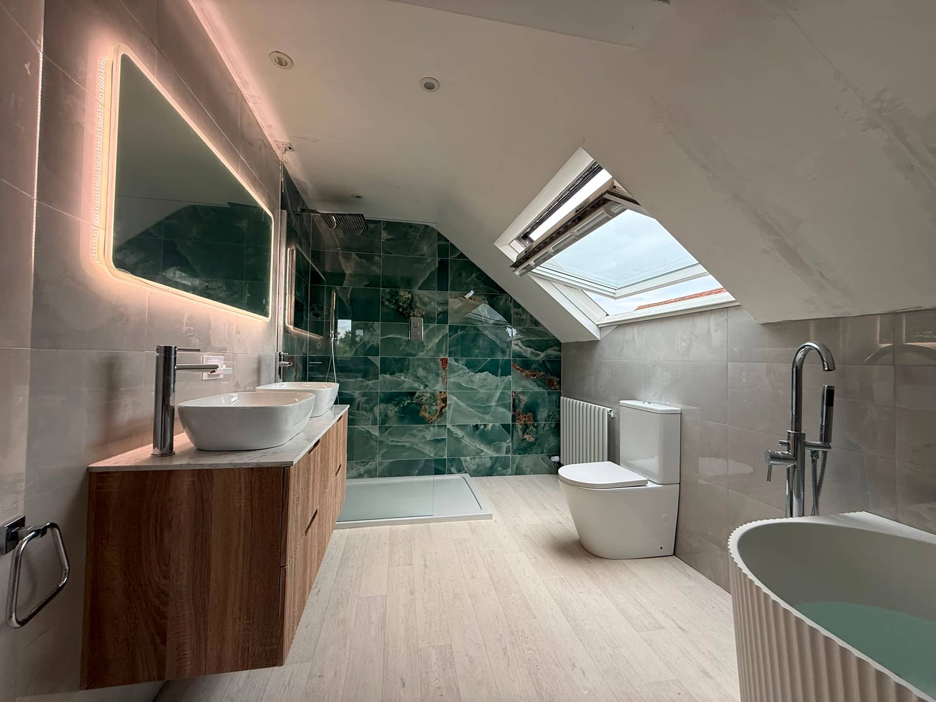 Completed green tiled bathroom with walk-in shower, Kent